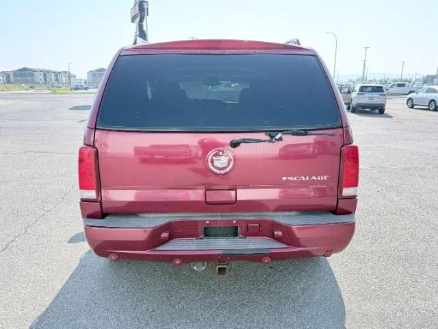 2004 RED /TAN Cadillac Escalade LUXURY (1GYEK63NX4R) with an 6.0L engine, AUTOMATIC transmission, located at 1235 N Woodruff Ave., Idaho Falls, 83401, (208) 523-1053, 43.507172, -112.000488 - At Timberline Auto, finding a great deal on your next vehicle is always easy! Our experienced sales staff goal is to help find you the right vehicle at the right price! Our knowledgeable finance department has options for almost any credit score. We offer extended service contract options to prot- Photo#3