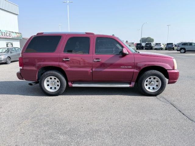 2004 RED /TAN Cadillac Escalade LUXURY (1GYEK63NX4R) with an 6.0L engine, AUTOMATIC transmission, located at 1235 N Woodruff Ave., Idaho Falls, 83401, (208) 523-1053, 43.507172, -112.000488 - At Timberline Auto, finding a great deal on your next vehicle is always easy! Our experienced sales staff goal is to help find you the right vehicle at the right price! Our knowledgeable finance department has options for almost any credit score. We offer extended service contract options to prot- Photo#7