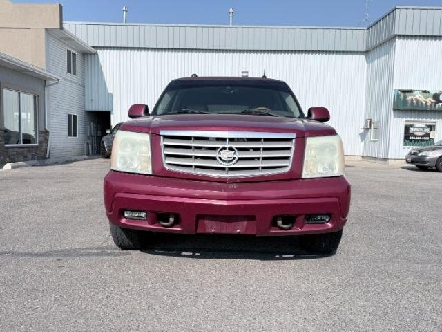 2004 RED /TAN Cadillac Escalade LUXURY (1GYEK63NX4R) with an 6.0L engine, AUTOMATIC transmission, located at 1235 N Woodruff Ave., Idaho Falls, 83401, (208) 523-1053, 43.507172, -112.000488 - At Timberline Auto, finding a great deal on your next vehicle is always easy! Our experienced sales staff goal is to help find you the right vehicle at the right price! Our knowledgeable finance department has options for almost any credit score. We offer extended service contract options to prot- Photo#9