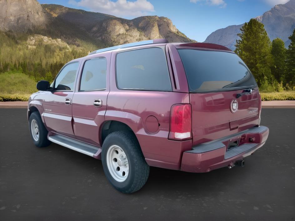 2004 RED /TAN Cadillac Escalade LUXURY (1GYEK63NX4R) with an 6.0L engine, AUTOMATIC transmission, located at 1235 N Woodruff Ave., Idaho Falls, 83401, (208) 523-1053, 43.507172, -112.000488 - At Timberline Auto, finding a great deal on your next vehicle is always easy! Our experienced sales staff goal is to help find you the right vehicle at the right price! Our knowledgeable finance department has options for almost any credit score. We offer extended service contract options to prot- Photo#2
