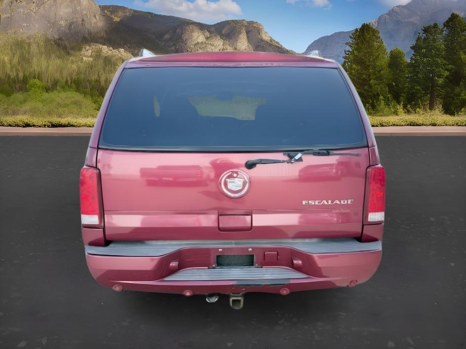 2004 RED /TAN Cadillac Escalade LUXURY (1GYEK63NX4R) with an 6.0L engine, AUTOMATIC transmission, located at 1235 N Woodruff Ave., Idaho Falls, 83401, (208) 523-1053, 43.507172, -112.000488 - At Timberline Auto, finding a great deal on your next vehicle is always easy! Our experienced sales staff goal is to help find you the right vehicle at the right price! Our knowledgeable finance department has options for almost any credit score. We offer extended service contract options to prot- Photo#3