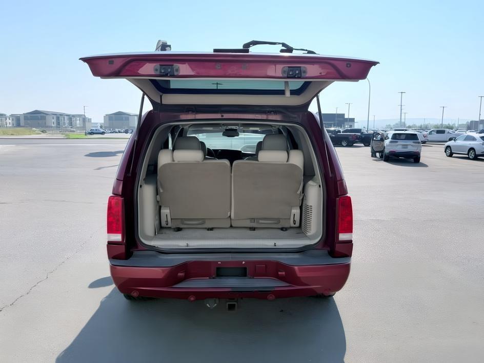 2004 RED /TAN Cadillac Escalade LUXURY (1GYEK63NX4R) with an 6.0L engine, AUTOMATIC transmission, located at 1235 N Woodruff Ave., Idaho Falls, 83401, (208) 523-1053, 43.507172, -112.000488 - At Timberline Auto, finding a great deal on your next vehicle is always easy! Our experienced sales staff goal is to help find you the right vehicle at the right price! Our knowledgeable finance department has options for almost any credit score. We offer extended service contract options to prot- Photo#4