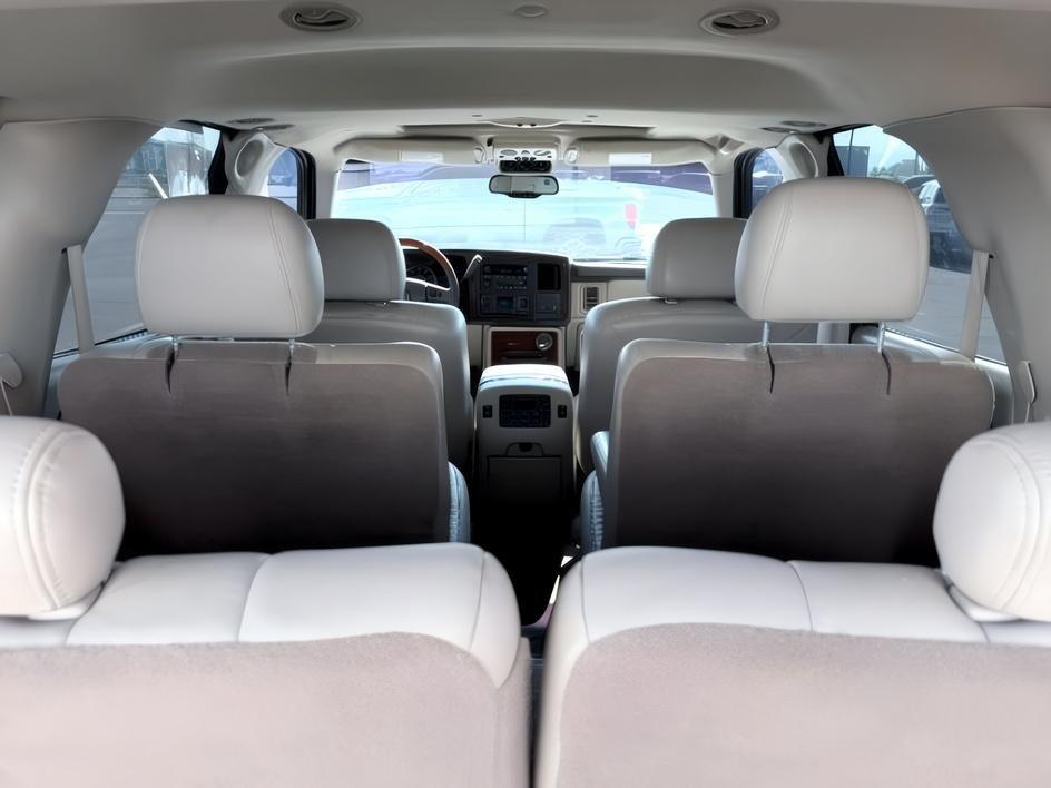 2004 RED /TAN Cadillac Escalade LUXURY (1GYEK63NX4R) with an 6.0L engine, AUTOMATIC transmission, located at 1235 N Woodruff Ave., Idaho Falls, 83401, (208) 523-1053, 43.507172, -112.000488 - At Timberline Auto, finding a great deal on your next vehicle is always easy! Our experienced sales staff goal is to help find you the right vehicle at the right price! Our knowledgeable finance department has options for almost any credit score. We offer extended service contract options to prot- Photo#5
