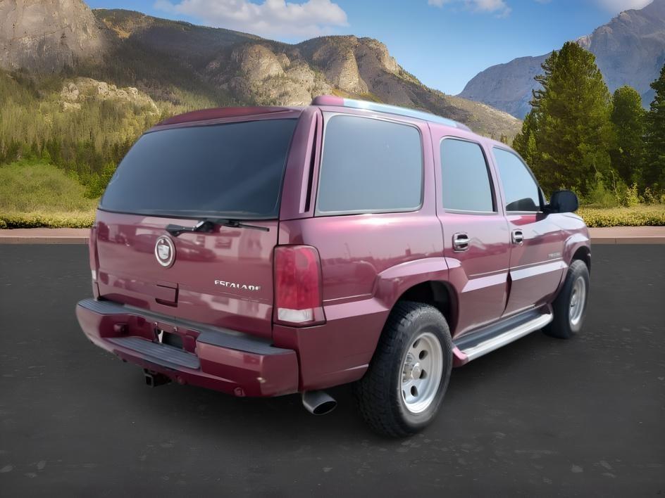2004 RED /TAN Cadillac Escalade LUXURY (1GYEK63NX4R) with an 6.0L engine, AUTOMATIC transmission, located at 1235 N Woodruff Ave., Idaho Falls, 83401, (208) 523-1053, 43.507172, -112.000488 - At Timberline Auto, finding a great deal on your next vehicle is always easy! Our experienced sales staff goal is to help find you the right vehicle at the right price! Our knowledgeable finance department has options for almost any credit score. We offer extended service contract options to prot- Photo#6