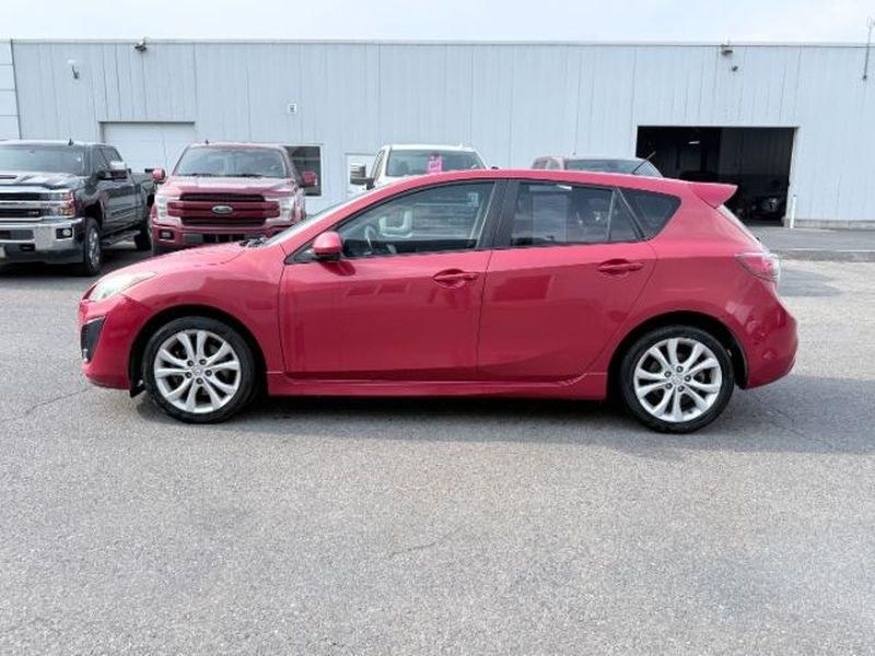 2010 Velocity Red Mica /Black Mazda Mazda3 s Sport (JM1BL1H55A1) with an 4 Cyl, 2.5L engine, 5-speed automatic transmission, located at 1175 N Woodruff Ave, Idaho Falls, ID, 83401, 43.506901, -111.999657 - <b>Vehicle Details</b><br>Looking for a sporty, reliable hatchback with premium features and confident performance? This 2010 Mazda Mazda3 S is a fantastic choice. Powered by a 4-cylinder, 2.5L gasoline engine and equipped with front-wheel drive, it delivers responsive handling and an engaging drive- Photo#1