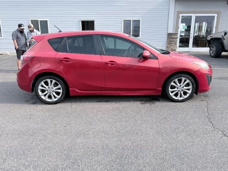2010 Velocity Red Mica /Black Mazda Mazda3 s Sport (JM1BL1H55A1) with an 4 Cyl, 2.5L engine, 5-speed automatic transmission, located at 1175 N Woodruff Ave, Idaho Falls, ID, 83401, 43.506901, -111.999657 - <b>Vehicle Details</b><br>Looking for a sporty, reliable hatchback with premium features and confident performance? This 2010 Mazda Mazda3 S is a fantastic choice. Powered by a 4-cylinder, 2.5L gasoline engine and equipped with front-wheel drive, it delivers responsive handling and an engaging drive- Photo#5