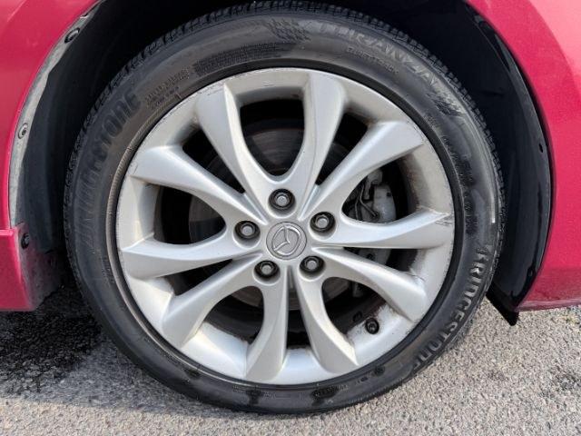 2010 Velocity Red Mica /Black Mazda Mazda3 s Sport (JM1BL1H55A1) with an 4 Cyl, 2.5L engine, 5-speed automatic transmission, located at 1175 N Woodruff Ave, Idaho Falls, ID, 83401, 43.506901, -111.999657 - <b>Vehicle Details</b><br>Looking for a sporty, reliable hatchback with premium features and confident performance? This 2010 Mazda Mazda3 S is a fantastic choice. Powered by a 4-cylinder, 2.5L gasoline engine and equipped with front-wheel drive, it delivers responsive handling and an engaging drive- Photo#55
