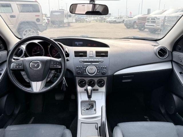 2010 Velocity Red Mica /Black Mazda Mazda3 s Sport (JM1BL1H55A1) with an 4 Cyl, 2.5L engine, 5-speed automatic transmission, located at 1175 N Woodruff Ave, Idaho Falls, ID, 83401, 43.506901, -111.999657 - <b>Vehicle Details</b><br>Looking for a sporty, reliable hatchback with premium features and confident performance? This 2010 Mazda Mazda3 S is a fantastic choice. Powered by a 4-cylinder, 2.5L gasoline engine and equipped with front-wheel drive, it delivers responsive handling and an engaging drive- Photo#66