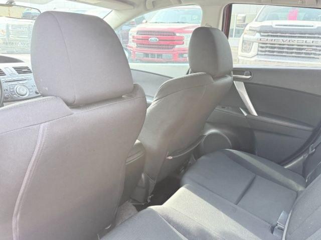2010 Velocity Red Mica /Black Mazda Mazda3 s Sport (JM1BL1H55A1) with an 4 Cyl, 2.5L engine, 5-speed automatic transmission, located at 1175 N Woodruff Ave, Idaho Falls, ID, 83401, 43.506901, -111.999657 - <b>Vehicle Details</b><br>Looking for a sporty, reliable hatchback with premium features and confident performance? This 2010 Mazda Mazda3 S is a fantastic choice. Powered by a 4-cylinder, 2.5L gasoline engine and equipped with front-wheel drive, it delivers responsive handling and an engaging drive- Photo#68