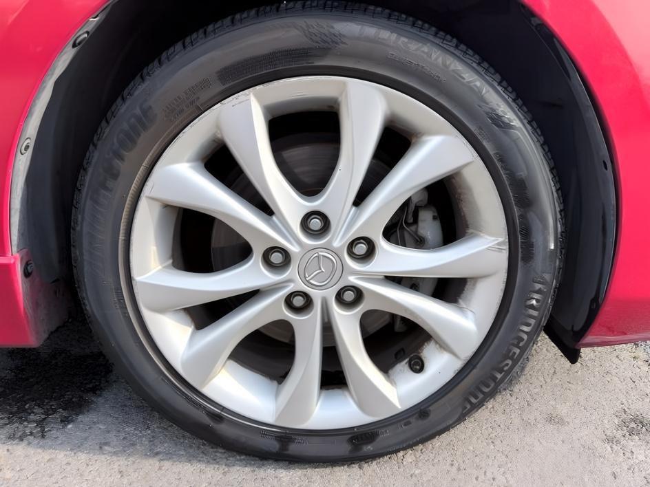 2010 Velocity Red Mica /Black Mazda Mazda3 s Sport (JM1BL1H55A1) with an 4 Cyl, 2.5L engine, 5-speed automatic transmission, located at 1175 N Woodruff Ave, Idaho Falls, ID, 83401, 43.506901, -111.999657 - <b>Vehicle Details</b><br>Looking for a sporty, reliable hatchback with premium features and confident performance? This 2010 Mazda Mazda3 S is a fantastic choice. Powered by a 4-cylinder, 2.5L gasoline engine and equipped with front-wheel drive, it delivers responsive handling and an engaging drive- Photo#32