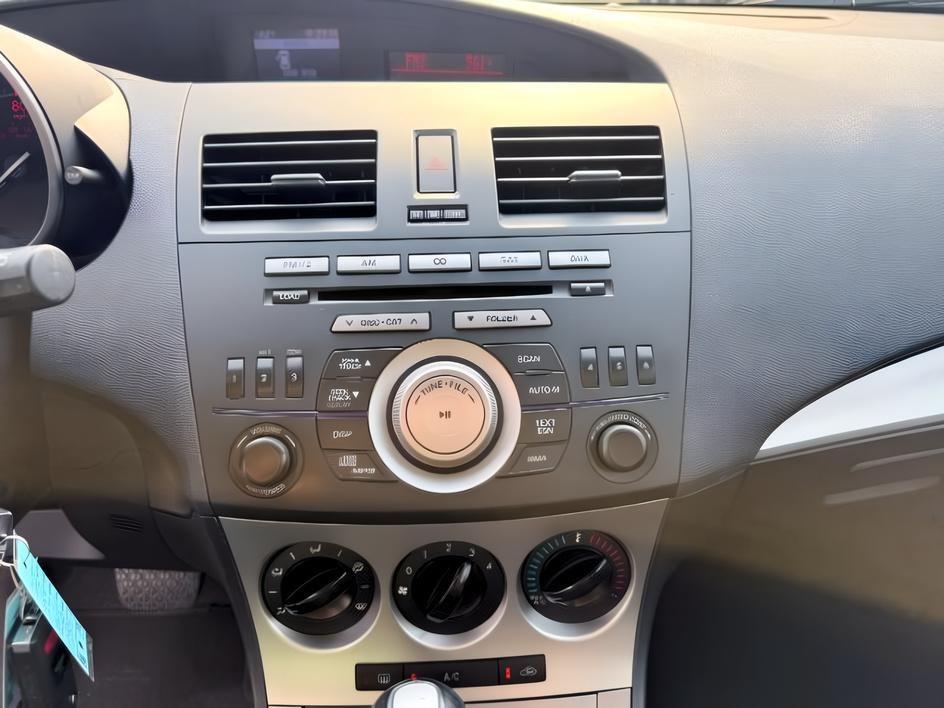2010 Velocity Red Mica /Black Mazda Mazda3 s Sport (JM1BL1H55A1) with an 4 Cyl, 2.5L engine, 5-speed automatic transmission, located at 1175 N Woodruff Ave, Idaho Falls, ID, 83401, 43.506901, -111.999657 - <b>Vehicle Details</b><br>Looking for a sporty, reliable hatchback with premium features and confident performance? This 2010 Mazda Mazda3 S is a fantastic choice. Powered by a 4-cylinder, 2.5L gasoline engine and equipped with front-wheel drive, it delivers responsive handling and an engaging drive- Photo#37