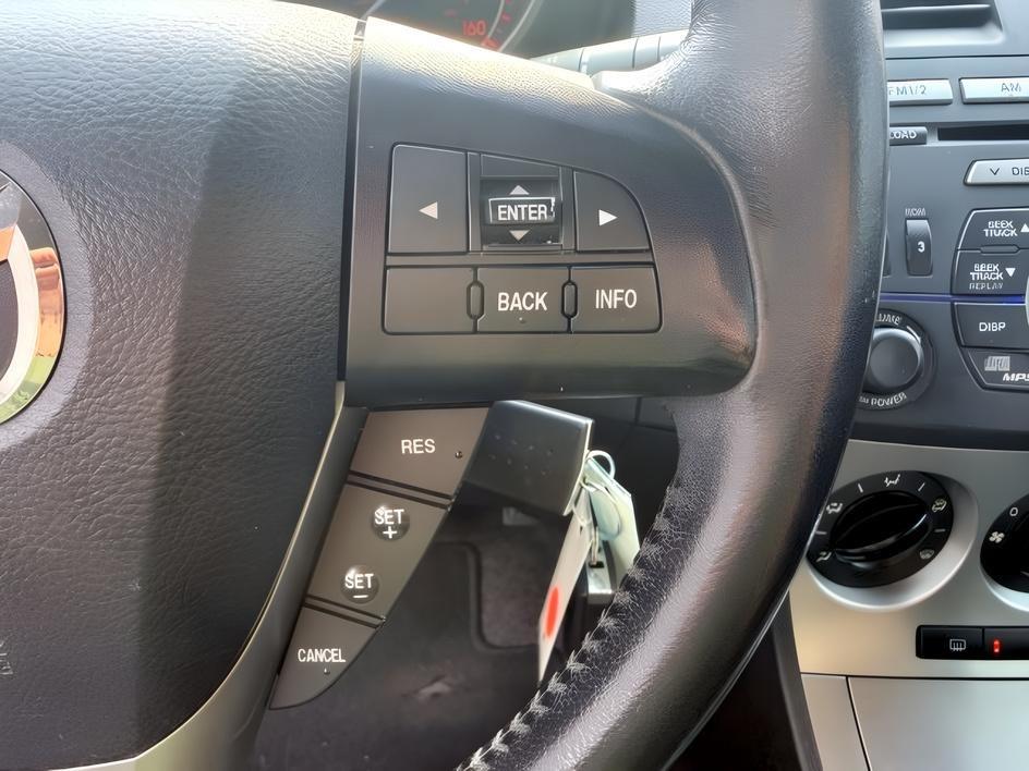 2010 Velocity Red Mica /Black Mazda Mazda3 s Sport (JM1BL1H55A1) with an 4 Cyl, 2.5L engine, 5-speed automatic transmission, located at 1175 N Woodruff Ave, Idaho Falls, ID, 83401, 43.506901, -111.999657 - <b>Vehicle Details</b><br>Looking for a sporty, reliable hatchback with premium features and confident performance? This 2010 Mazda Mazda3 S is a fantastic choice. Powered by a 4-cylinder, 2.5L gasoline engine and equipped with front-wheel drive, it delivers responsive handling and an engaging drive- Photo#39