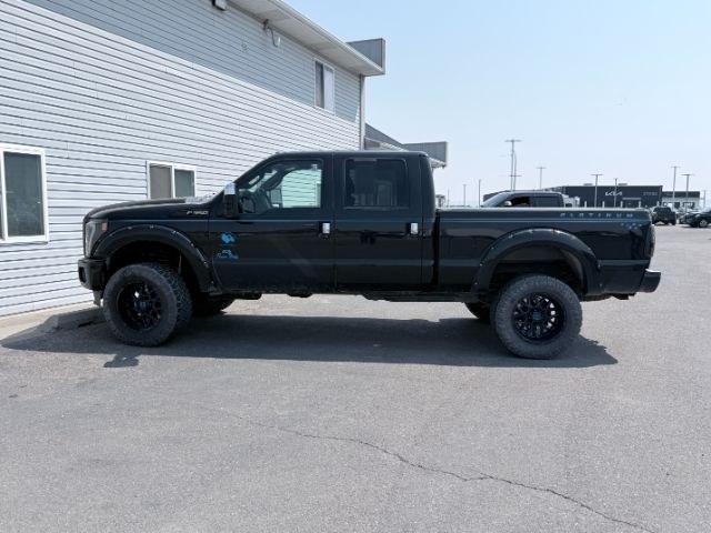 2013 BLACK /Black Ford F-350 Platinum (1FT8W3BT0DE) with an Powerstroke 6.7L V-8 xxxxxx engine, AUTOMATIC transmission, located at 1235 N Woodruff Ave., Idaho Falls, 83401, (208) 523-1053, 43.507172, -112.000488 - At Timberline Auto, finding a great deal on your next vehicle is always easy! Our experienced sales staff goal is to help find you the right vehicle at the right price! Our knowledgeable finance department has options for almost any credit score. We offer extended service contract options to prot- Photo#1