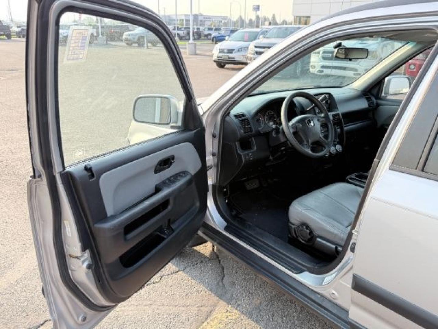 2004 SILVER /Black Honda CR-V (JHLRD78844C) with an 24L I-4 DOHC engine, Automatic transmission, located at 1175 N Woodruff Ave, Idaho Falls, ID, 83401, 43.506901, -111.999657 - At Timberline Auto, finding a great deal on your next vehicle is always easy! Our experienced sales staff goal is to help find you the right vehicle at the right price! Our knowledgeable finance department has options for almost any credit score. We offer extended service contract options to prot- Photo#35