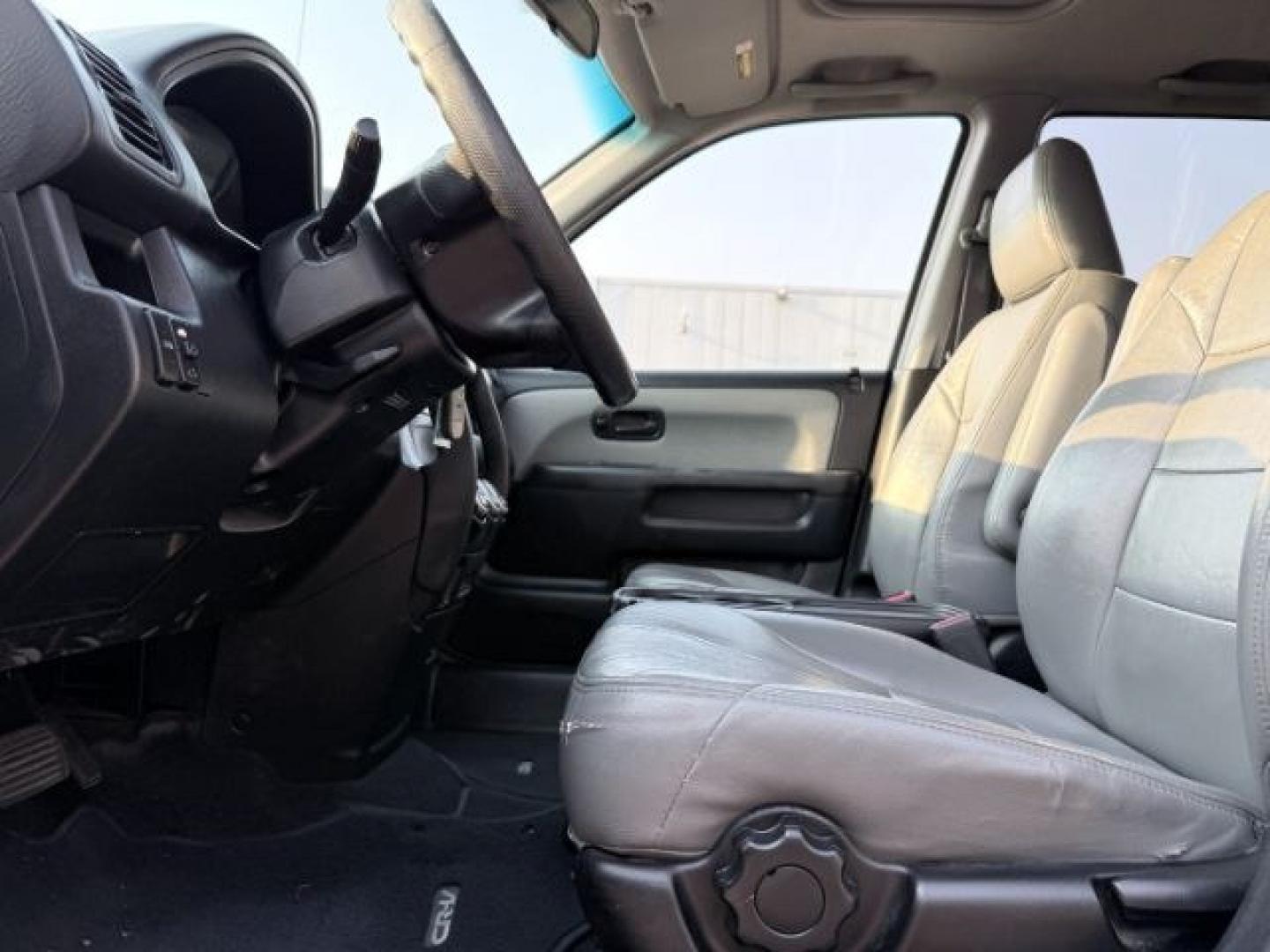 2004 SILVER /Black Honda CR-V (JHLRD78844C) with an 24L I-4 DOHC engine, Automatic transmission, located at 1175 N Woodruff Ave, Idaho Falls, ID, 83401, 43.506901, -111.999657 - At Timberline Auto, finding a great deal on your next vehicle is always easy! Our experienced sales staff goal is to help find you the right vehicle at the right price! Our knowledgeable finance department has options for almost any credit score. We offer extended service contract options to prot- Photo#36