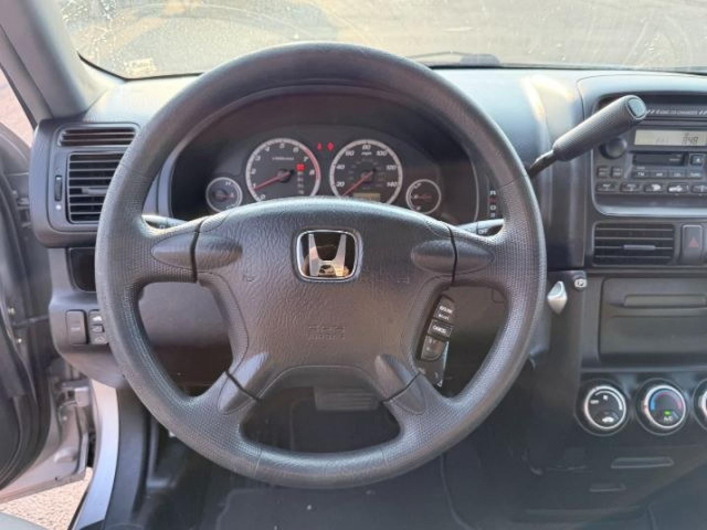 2004 SILVER /Black Honda CR-V (JHLRD78844C) with an 24L I-4 DOHC engine, Automatic transmission, located at 1175 N Woodruff Ave, Idaho Falls, ID, 83401, 43.506901, -111.999657 - At Timberline Auto, finding a great deal on your next vehicle is always easy! Our experienced sales staff goal is to help find you the right vehicle at the right price! Our knowledgeable finance department has options for almost any credit score. We offer extended service contract options to prot- Photo#38