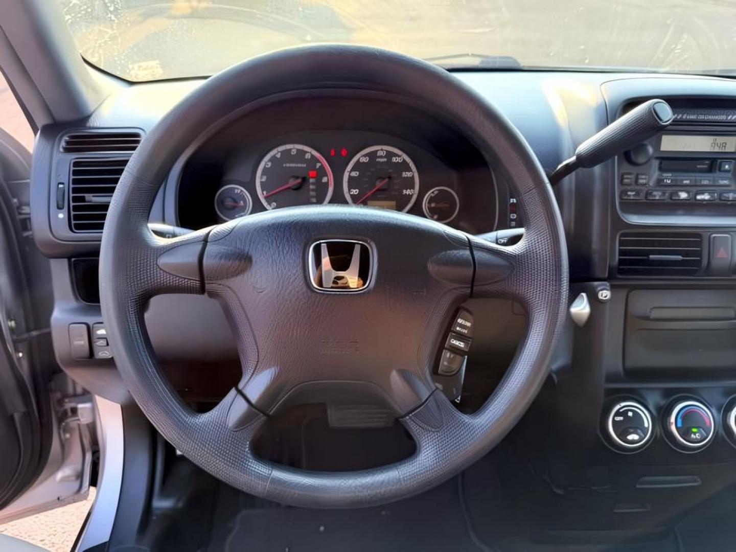 2004 SILVER /Black Honda CR-V (JHLRD78844C) with an 24L I-4 DOHC engine, Automatic transmission, located at 1175 N Woodruff Ave, Idaho Falls, ID, 83401, 43.506901, -111.999657 - At Timberline Auto, finding a great deal on your next vehicle is always easy! Our experienced sales staff goal is to help find you the right vehicle at the right price! Our knowledgeable finance department has options for almost any credit score. We offer extended service contract options to prot- Photo#14