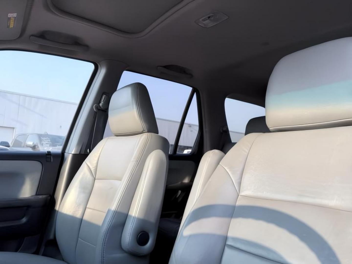 2004 SILVER /Black Honda CR-V (JHLRD78844C) with an 24L I-4 DOHC engine, Automatic transmission, located at 1175 N Woodruff Ave, Idaho Falls, ID, 83401, 43.506901, -111.999657 - At Timberline Auto, finding a great deal on your next vehicle is always easy! Our experienced sales staff goal is to help find you the right vehicle at the right price! Our knowledgeable finance department has options for almost any credit score. We offer extended service contract options to prot- Photo#19