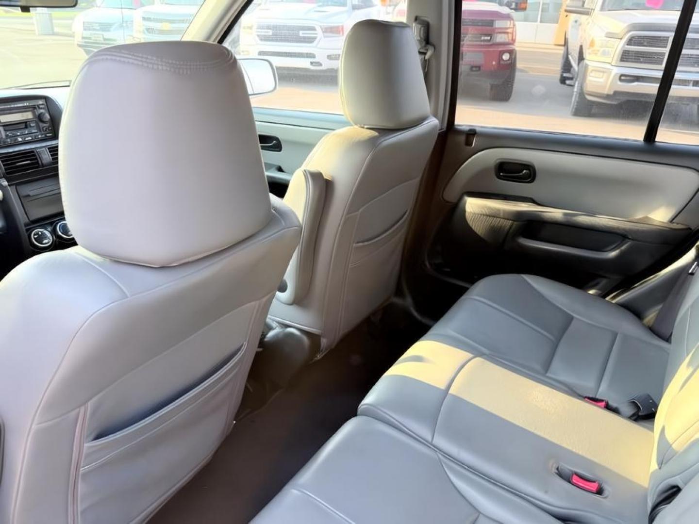 2004 SILVER /Black Honda CR-V (JHLRD78844C) with an 24L I-4 DOHC engine, Automatic transmission, located at 1175 N Woodruff Ave, Idaho Falls, ID, 83401, 43.506901, -111.999657 - At Timberline Auto, finding a great deal on your next vehicle is always easy! Our experienced sales staff goal is to help find you the right vehicle at the right price! Our knowledgeable finance department has options for almost any credit score. We offer extended service contract options to prot- Photo#22