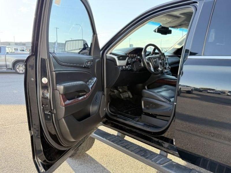2018 Onyx Black /Jet Black GMC Yukon SLT (1GKS2BKC7JR) with an V8, 5.3L engine, 6-speed automatic transmission, located at 1175 N Woodruff Ave, Idaho Falls, ID, 83401, 43.506901, -111.999657 - <b>Vehicle Details</b><br>Shop this 2018 GMC Yukon 1500 SLT 4WD in Idaho Falls, ID and upgrade your next drive with a full-size SUV built for comfort, capability, and confidence. Powered by a V8 5.3L gasoline engine, this GMC Yukon delivers strong performance for towing, commuting, and family road t- Photo#13