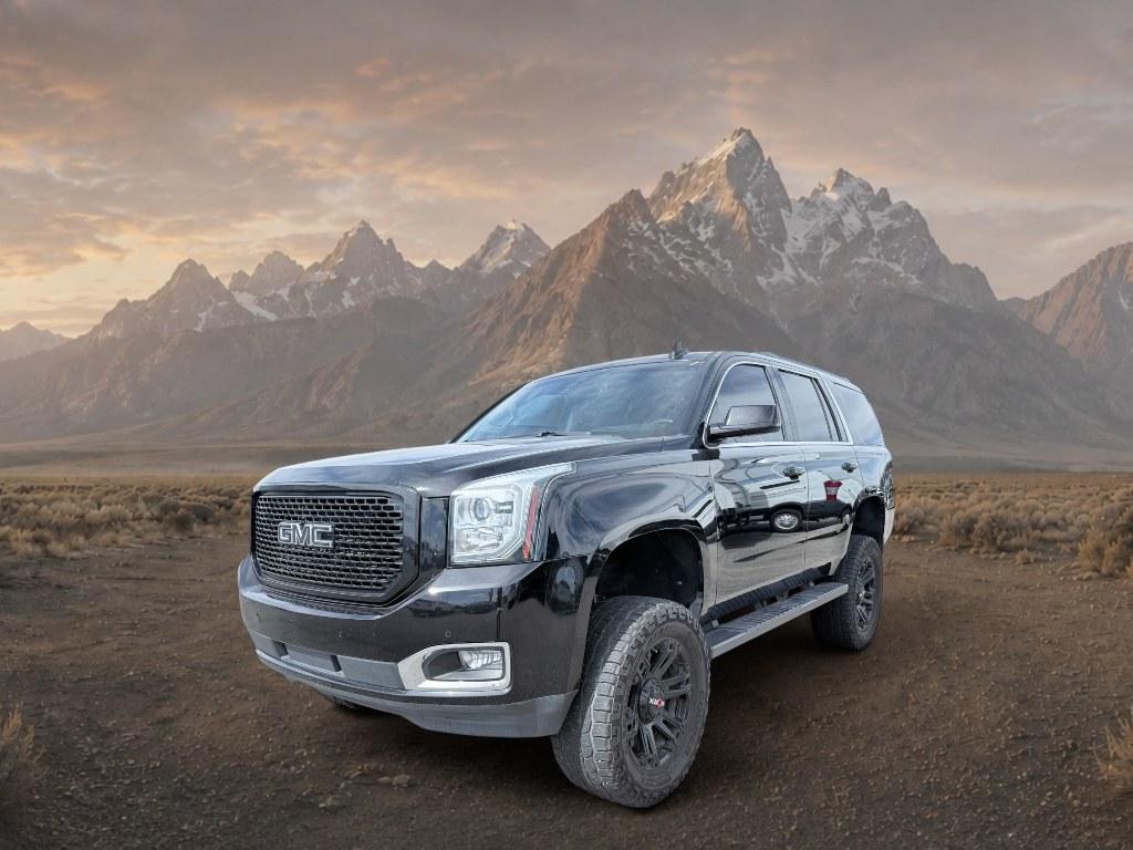 2018 Onyx Black /Jet Black GMC Yukon SLT (1GKS2BKC7JR) with an V8, 5.3L engine, 6-speed automatic transmission, located at 1175 N Woodruff Ave, Idaho Falls, ID, 83401, 43.506901, -111.999657 - <b>Vehicle Details</b><br>Shop this 2018 GMC Yukon 1500 SLT 4WD in Idaho Falls, ID and upgrade your next drive with a full-size SUV built for comfort, capability, and confidence. Powered by a V8 5.3L gasoline engine, this GMC Yukon delivers strong performance for towing, commuting, and family road t- Photo#0