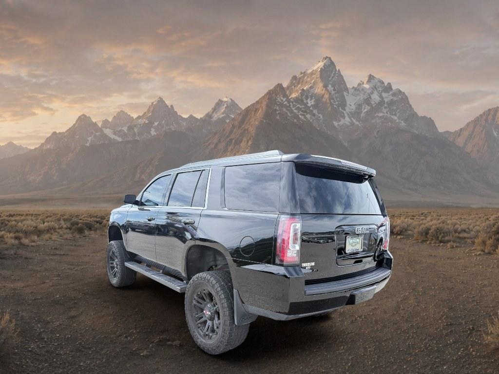 2018 Onyx Black /Jet Black GMC Yukon SLT (1GKS2BKC7JR) with an V8, 5.3L engine, 6-speed automatic transmission, located at 1175 N Woodruff Ave, Idaho Falls, ID, 83401, 43.506901, -111.999657 - <b>Vehicle Details</b><br>Shop this 2018 GMC Yukon 1500 SLT 4WD in Idaho Falls, ID and upgrade your next drive with a full-size SUV built for comfort, capability, and confidence. Powered by a V8 5.3L gasoline engine, this GMC Yukon delivers strong performance for towing, commuting, and family road t- Photo#2