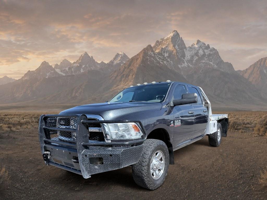 2017 Maximum Steel Metallic Clearcoat /Diesel Gray/Black Ram 3500 Tradesman (3C63R3GLXHG) with an 6 Cyl, 6.7L engine, 6-speed automatic transmission, located at 1175 N Woodruff Ave, Idaho Falls, ID, 83401, 43.506901, -111.999657 - <b>Vehicle Details</b><br>Take on tough jobs with confidence in this capable 2017 Ram 3500 ST, now available in Idaho Falls, ID. Built for serious work and dependable performance, this heavy-duty pickup is powered by a 6 Cyl, 6.7L Diesel engine paired with 4WD, giving you the strength and traction n- Photo#0