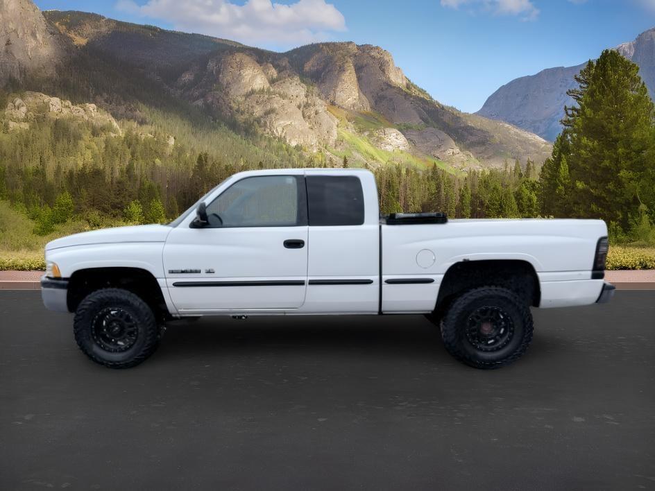 1998 WHITE /Mist Grey Dodge Ram 1500 (3B7HF12Y3WM) with an Magnum 52L V-8 regular unleaded engine, Manual transmission, located at 1175 N Woodruff Ave, Idaho Falls, ID, 83401, 43.506901, -111.999657 - At Timberline Auto, finding a great deal on your next vehicle is always easy! Our experienced sales staff goal is to help find you the right vehicle at the right price! Our knowledgeable finance department has options for almost any credit score. We offer extended service contract options to prot- Photo#0