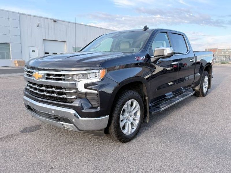 2024 GRAY /Jet Black Chevrolet Silverado LTZ (1GCUDGEDXRZ) with an V8, 5.3L engine, 10-speed automatic transmission, located at 1175 N Woodruff Ave, Idaho Falls, ID, 83401, 43.506901, -111.999657 - <b>Vehicle Details</b><br>Find capability, comfort, and premium style in this pre-owned 2024 Chevrolet Silverado 1500 LTZ 4WD, now available in Idaho Falls, ID. Powered by a V8, 5.3L gasoline engine, this Chevrolet Silverado delivers confident performance for towing, hauling, and everyday driving. T- Photo#0