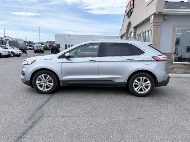 2020 SILVER /Ebony Ford Edge (2FMPK4J93LB) with an EcoBoost 2L I-4 gasoline direct injection engine, Automatic transmission, located at 1175 N Woodruff Ave, Idaho Falls, ID, 83401, 43.506901, -111.999657 - At Timberline Auto, finding a great deal on your next vehicle is always easy! Our experienced sales staff goal is to help find you the right vehicle at the right price! Our knowledgeable finance department has options for almost any credit score. We offer extended service contract options to prot- Photo#1
